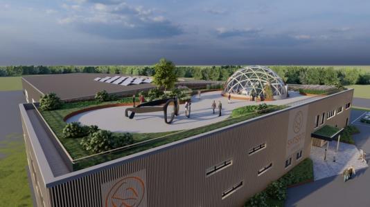 Visionsbild över fabrikens tak, med en staty föreställandes glasögonbågar. Bågarna som tillverkas i fabriken kommer tillverkas av cirkulära, återvunna eller lokala material från framför allt Sverige, Skandinavien och Europa (bilden är en illustration).