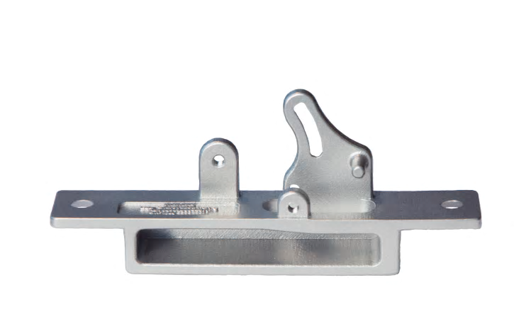Del av dörrlås, 3D-printad i rostfritt stål. Originalet tillverkades på 40-talet i aluminium med en process som idag skulle vara dyr att reproducera.